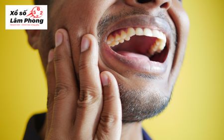 Nằm mơ thấy rụng một chiếc răng hàm dưới không chảy máu